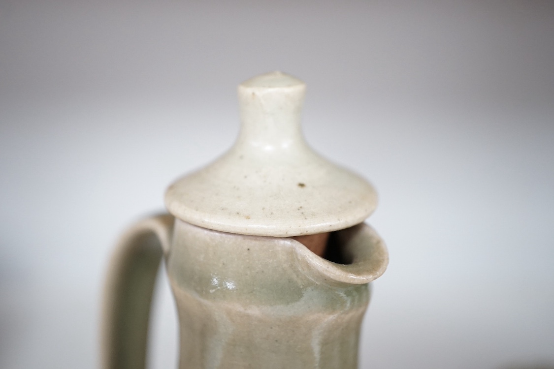 A David Leach St Ives pottery celadon glazed sake set comprising baluster lidded decanter and six stem cups, largest 23cm high. Condition - good